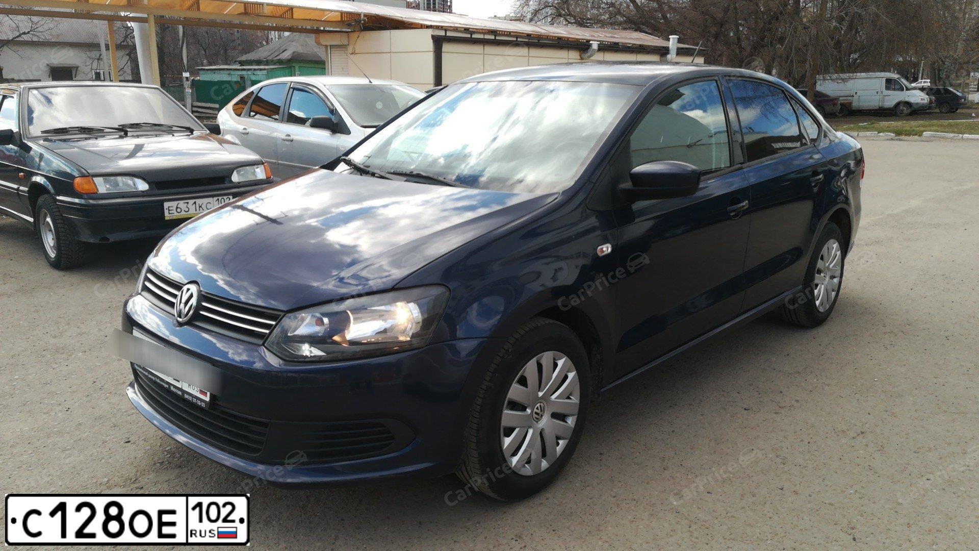 Фото автомобиля VOLKSWAGEN POLO, 2014 — госномер С128ОЕ102. Цвет: ТЕМНО-СИНИЙ