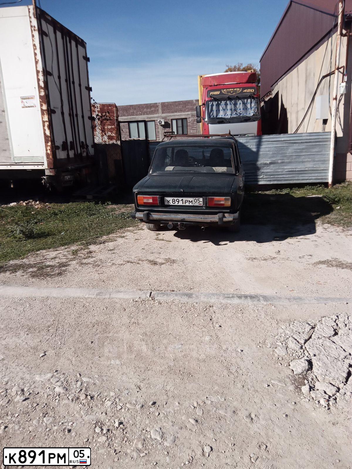 Фото автомобиля LADA 2106, 2004 — госномер К891РМ05. Цвет: ТЕМНО-ЗЕЛЕНЫЙ