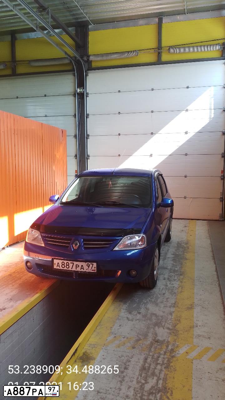 Фото автомобиля RENAULT LOGAN, 2009 — госномер Н291УК32. Цвет: СИНИЙ МЕТАЛЛИК