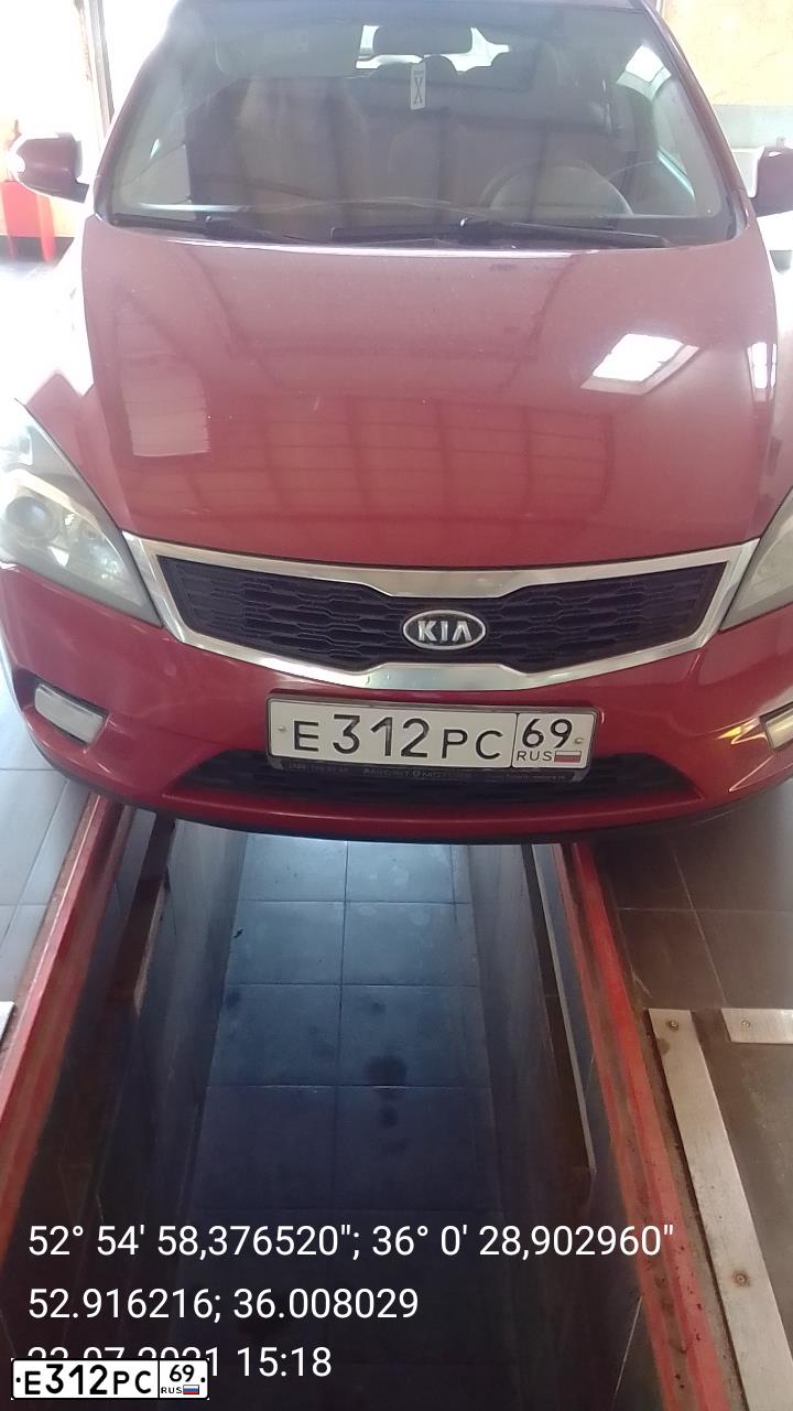 Фото автомобиля KIA CEE'D, 2010 — госномер Е312РС69. Цвет: Красный