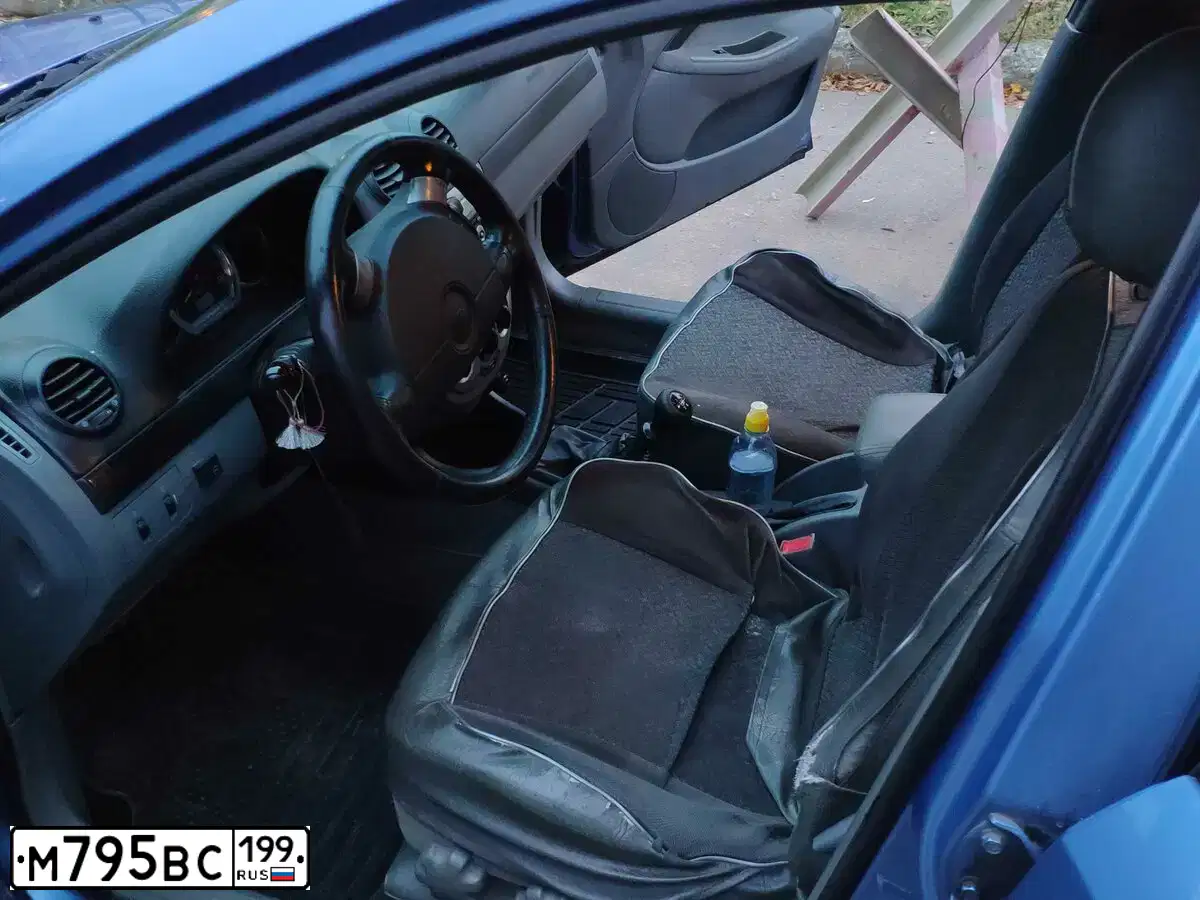 Фото автомобиля CHEVROLET LACETTI, 2008 — госномер О172КХ46. Цвет: синий
