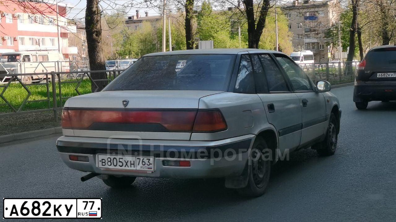 Фото автомобиля MAZDA 3, 2006 — госномер М784НВ186. Цвет: ЧЕРНЫЙ