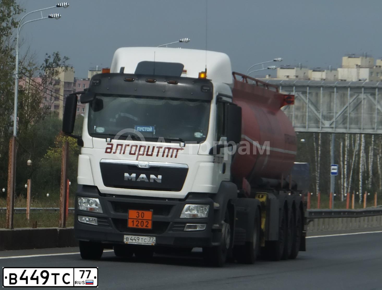 Фото автомобиля MAN TGS 19.XXX /4X2/, 2013 — госномер В449ТС77. Цвет: Белый