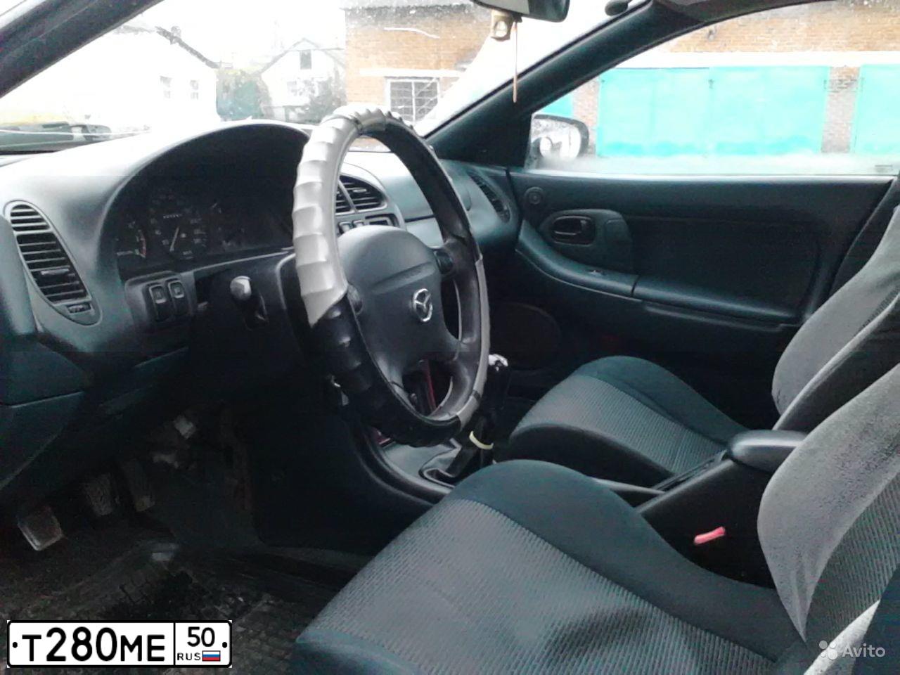 Фото автомобиля MAZDA 323, 1995 — госномер Т280МЕ50. Цвет: СВЕТЛЫЙ СЕРЫЙ