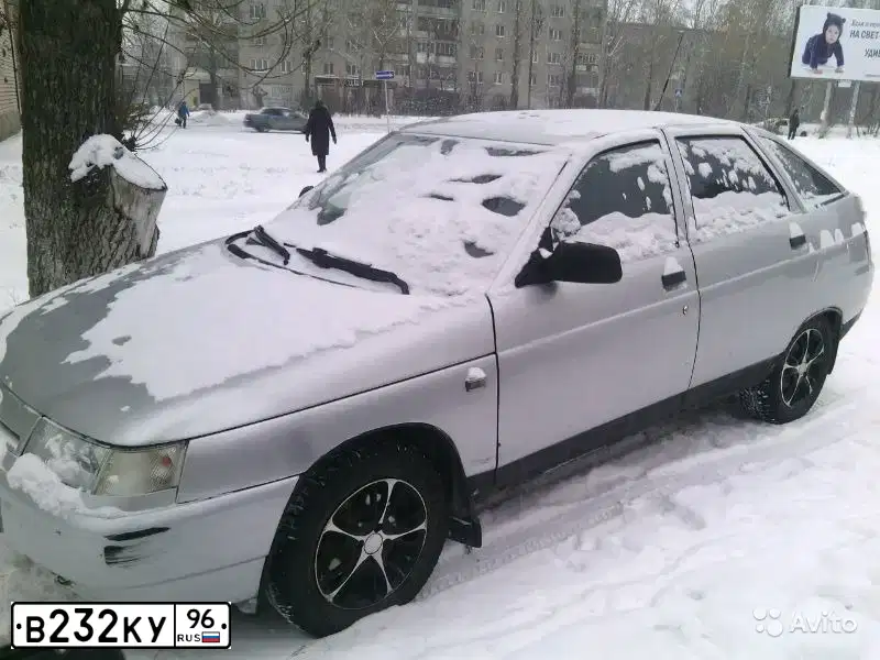 Фото автомобиля LADA 2112, 2003 — госномер В232КУ96. Цвет: СВЕТЛО-СЕРЫЙ