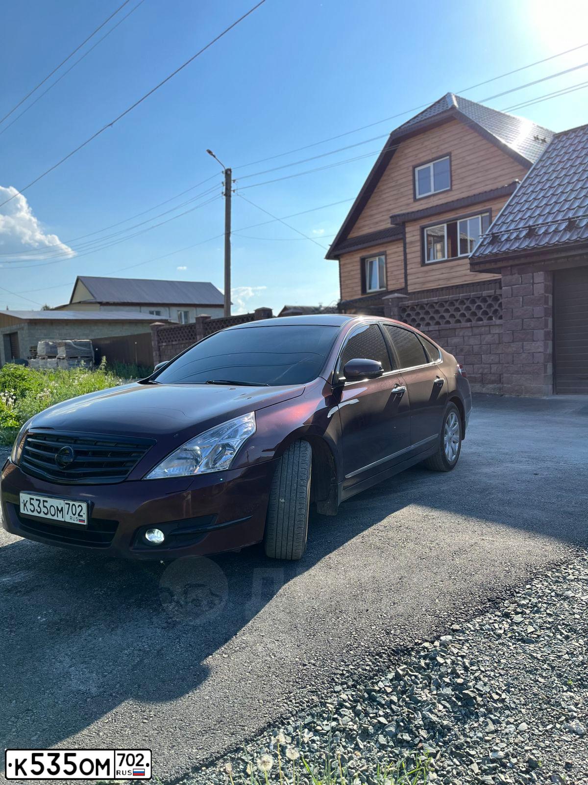 Фото автомобиля NISSAN TEANA, 2008 — госномер К494КТ774. Цвет: ТЕМНО-КРАСНЫЙ