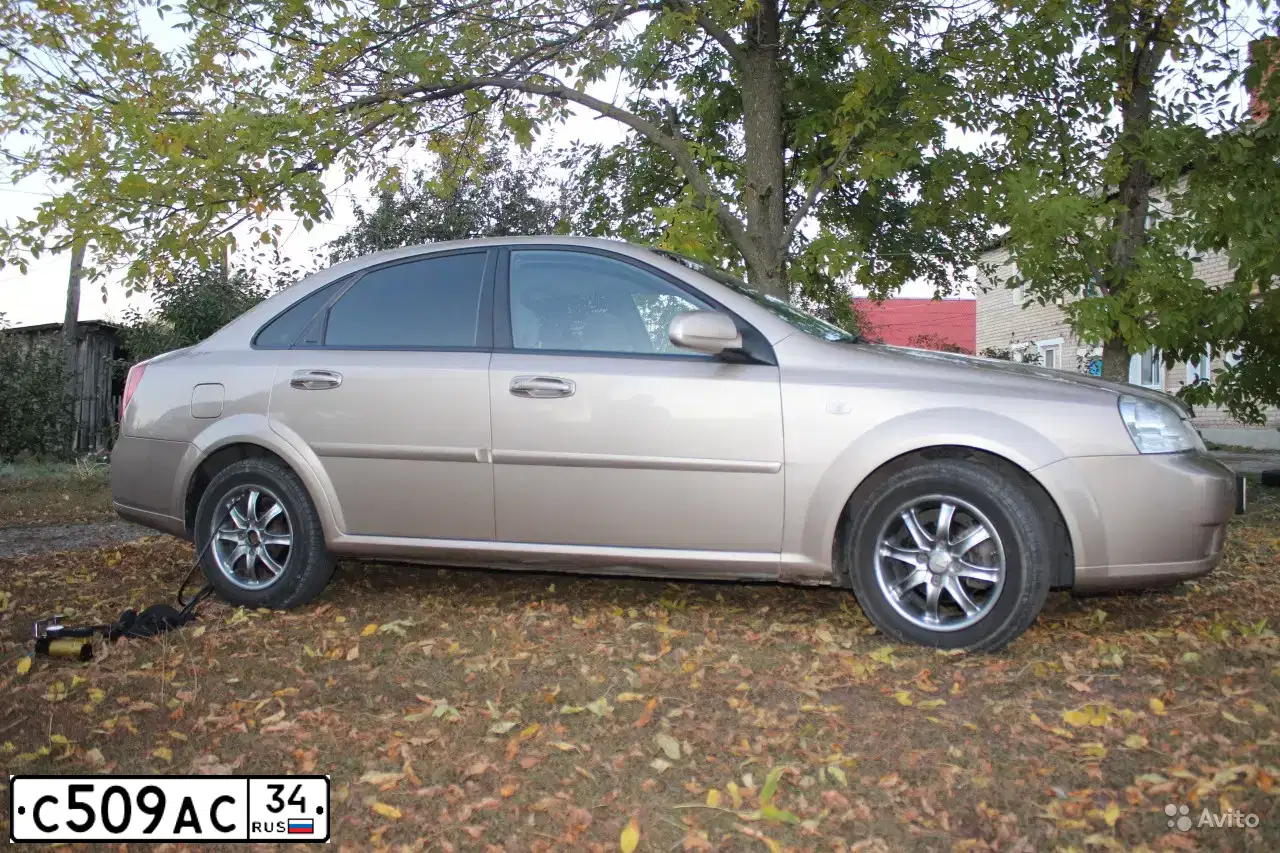 Фото автомобиля CHEVROLET T LACETTI, 2006 — госномер Н584МА134. Цвет: БЕЖЕВЫЙ