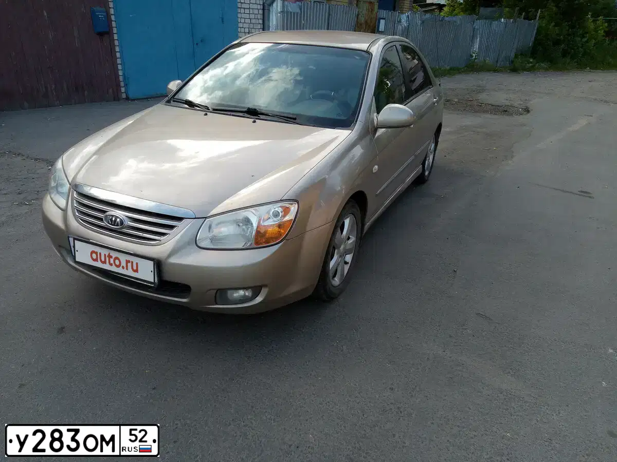 Фото автомобиля KIA CERATO, 2007 — госномер У283ОМ52. Цвет: ЗОЛОТИСТЫЙ