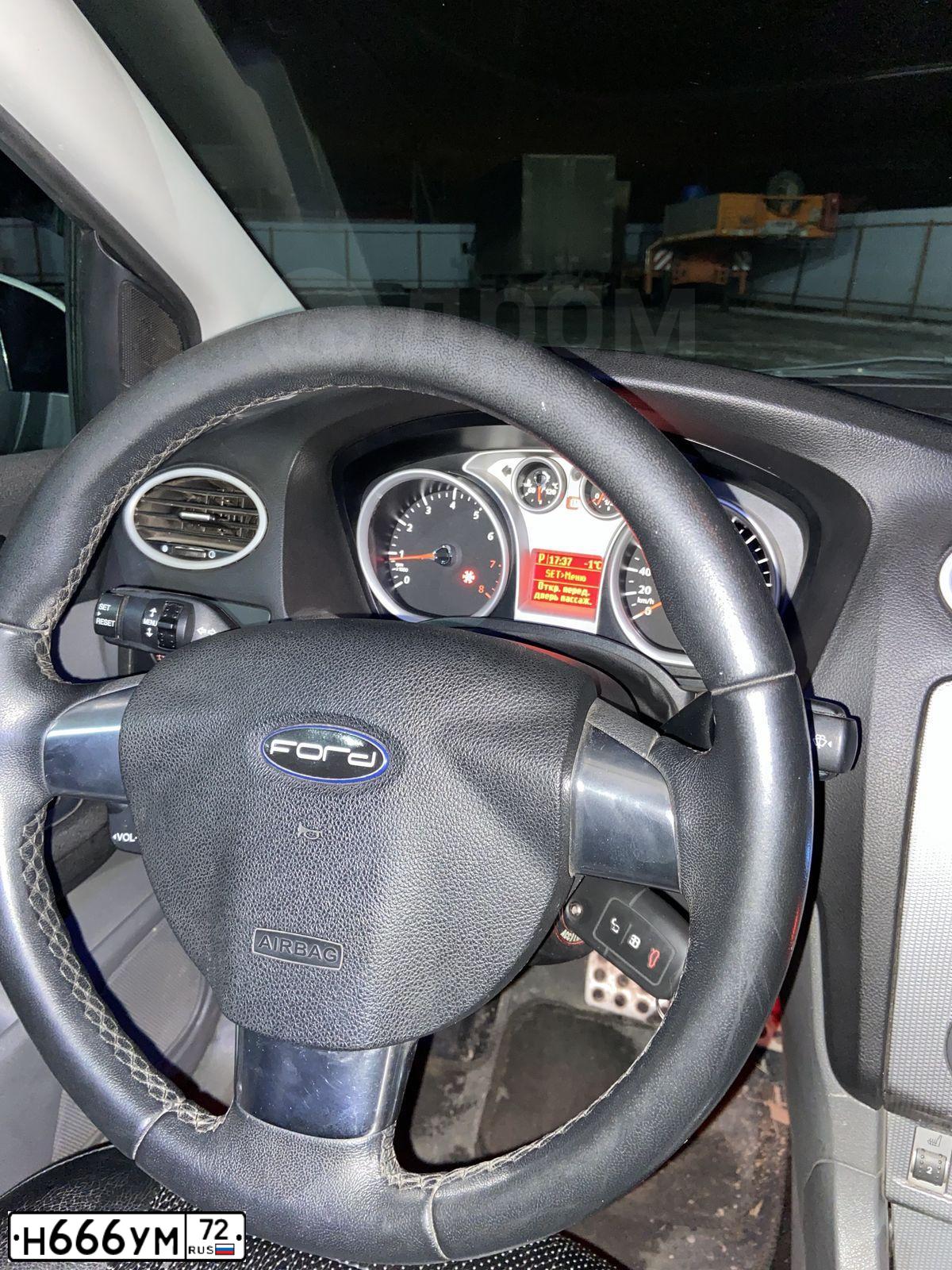 Фото автомобиля FORD FOCUS, 2011 — госномер Е357УО702. Цвет: ЧЕРНЫЙ