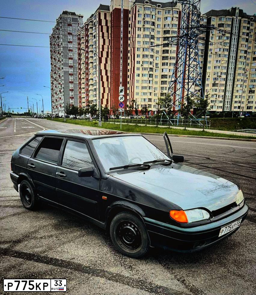 Фото автомобиля LADA 2114 SAMARA, 2009 — госномер Р775КР33. Цвет: Темно-зеленый