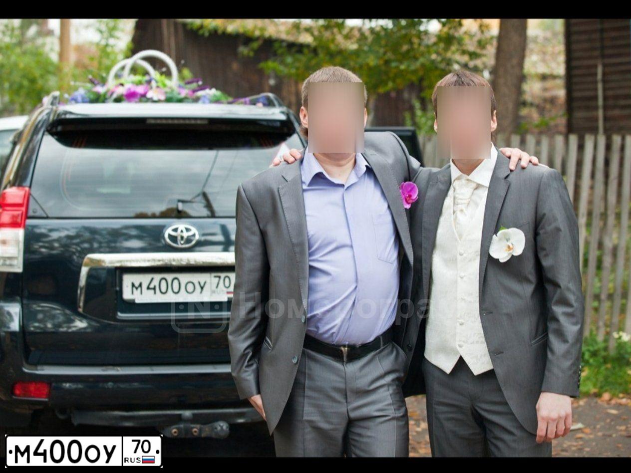 Фото автомобиля TOYOTA LANDCRUISER, 2010 — госномер М400ОУ70. Цвет: ТЕМНО-СЕРЫЙ