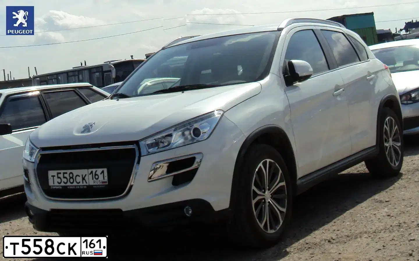 Фото автомобиля PEUGEOT 4008, 2012 — госномер Т558СК161. Цвет: БЕЛЫЙ