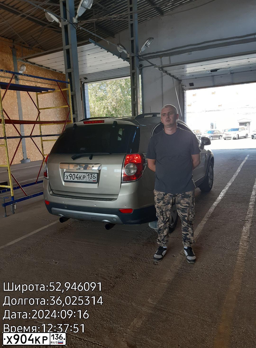 Фото автомобиля CHEVROLET CAPTIVA, 2007 — госномер С001КН57. Цвет: БЕЖЕВО-СЕРЫЙ