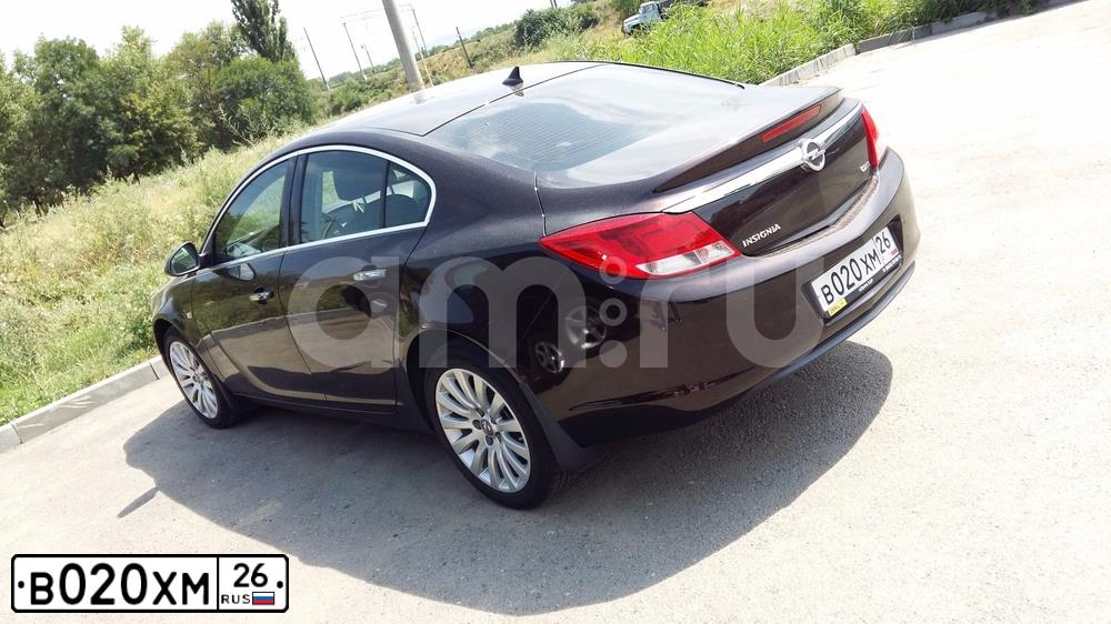 Фото автомобиля OPEL INSIGNIA, 2011 — госномер В020ХМ26. Цвет: Коричневый