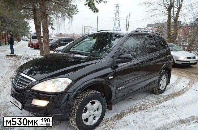Фото автомобиля SSANGYONG KYRON, 2010 — госномер О148СР71. Цвет: ЧЕРНЫЙ
