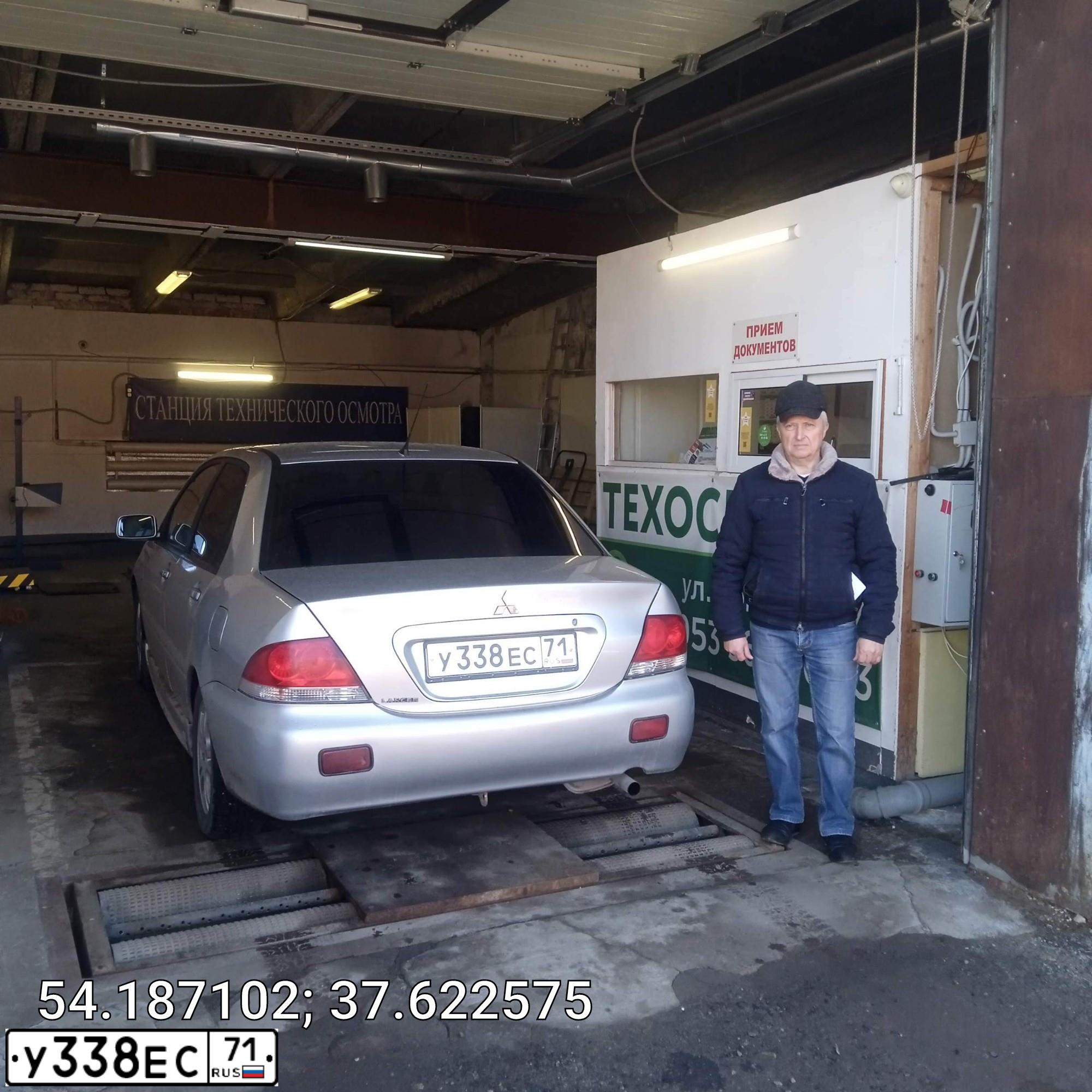 Фото автомобиля MITSUBISHI LANCER, 2004 — госномер У338ЕС71. Цвет: Серый