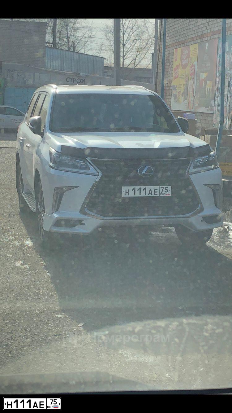 Фото автомобиля MITSUBISHI L 200, 2019 — госномер Н111АЕ75. Цвет: Белый