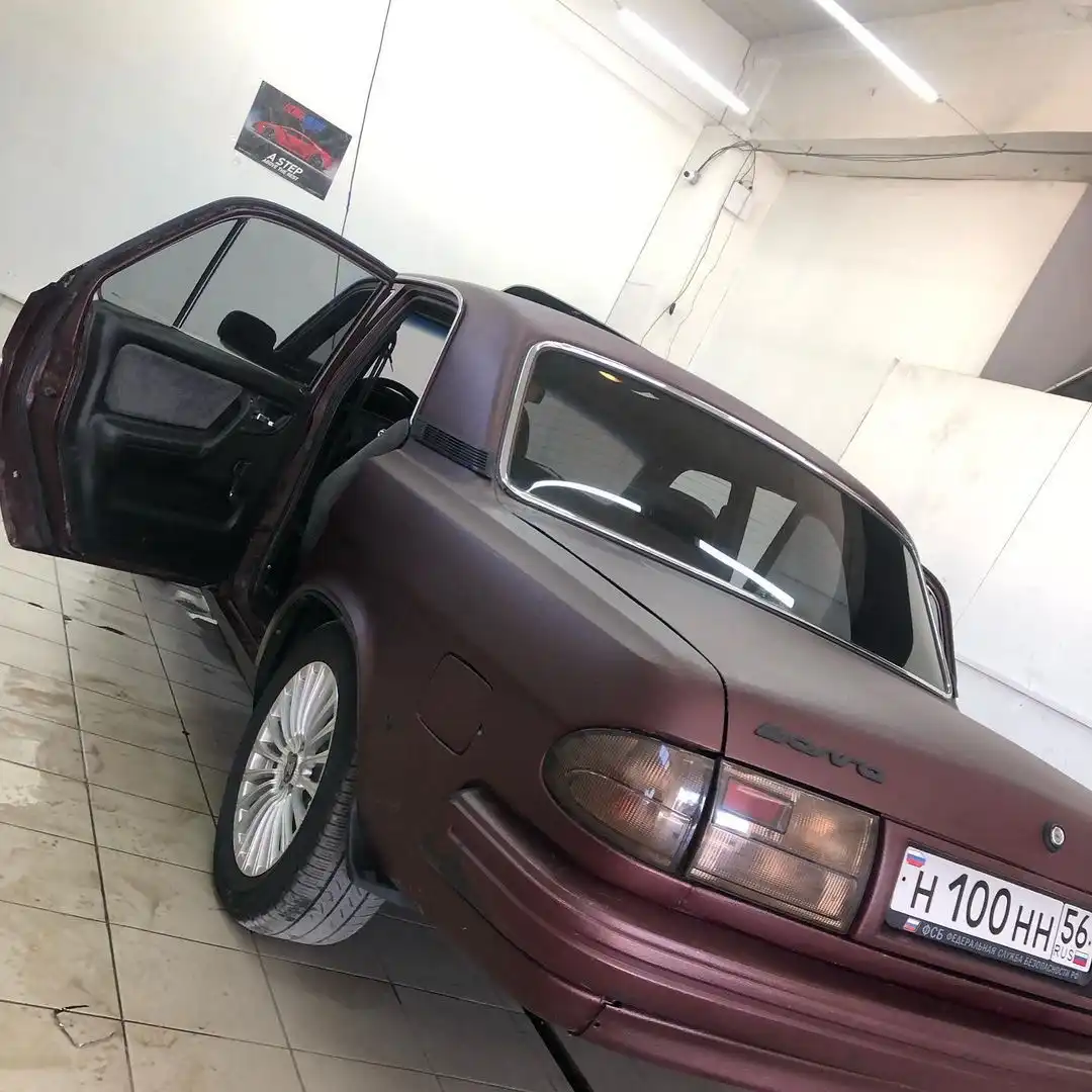 Фото автомобиля GAZ 3110 WOLGA, 1997 — госномер Н100НН56. Цвет: ГРАНАТ