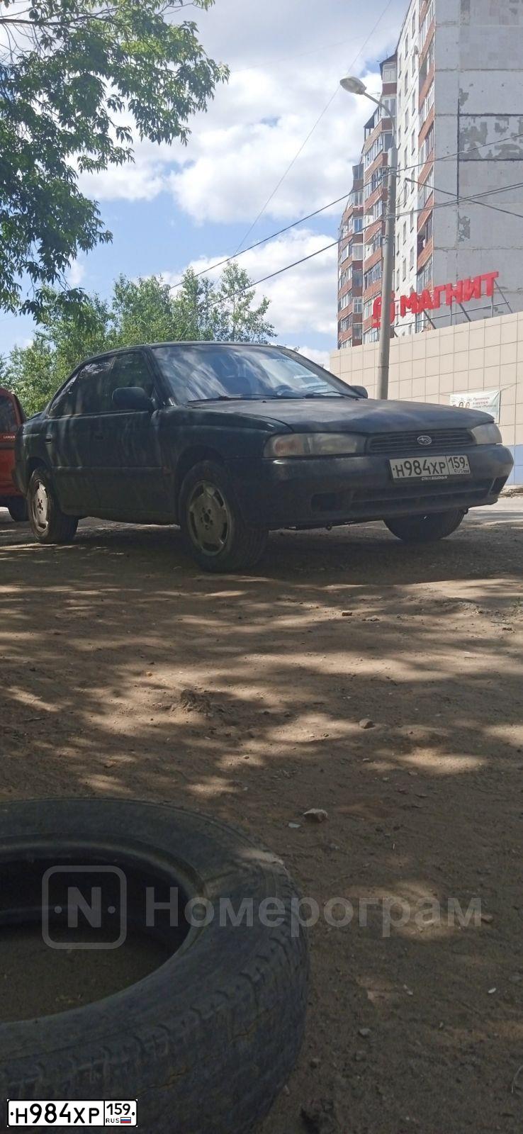 Фото автомобиля SUBARU LEGACY, 1995 — госномер Н984ХР159. Цвет: ЗЕЛЕНЫЙ