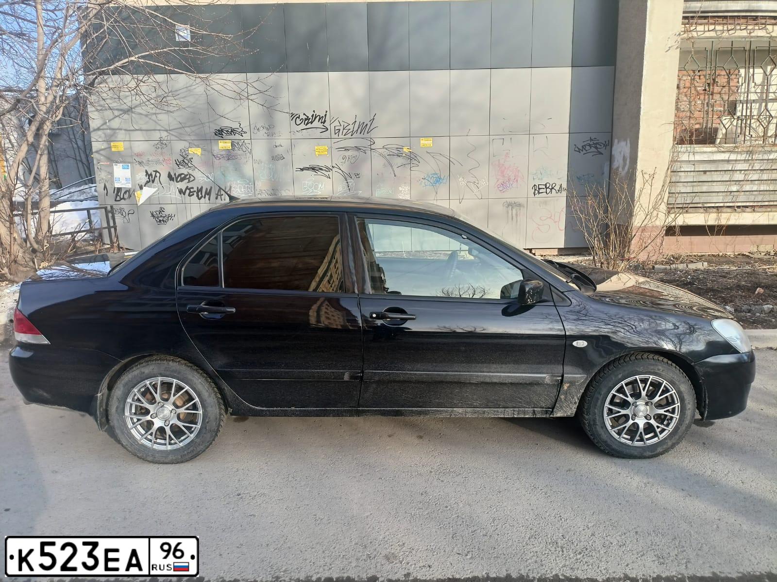 Фото автомобиля MITSUBISHI LANCER, 2004 — госномер А632МК172. Цвет: ЧЕРНЫЙ