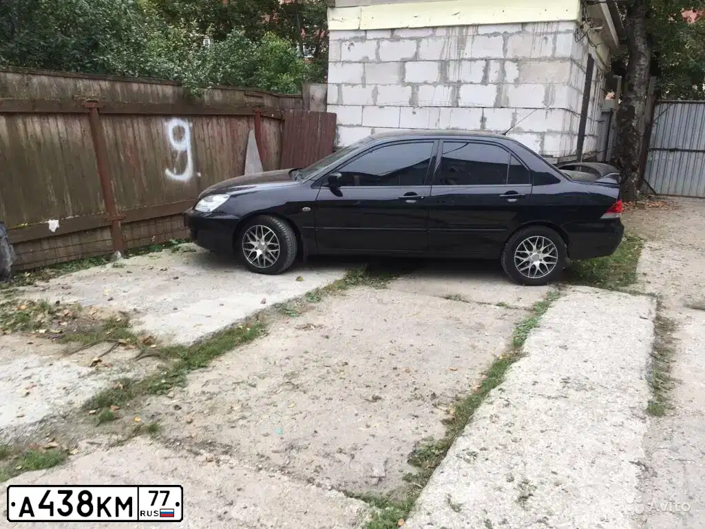 Фото автомобиля MITSUBISHI LANCER, 2007 — госномер М332ХА177. Цвет: ЧЕРНЫЙ