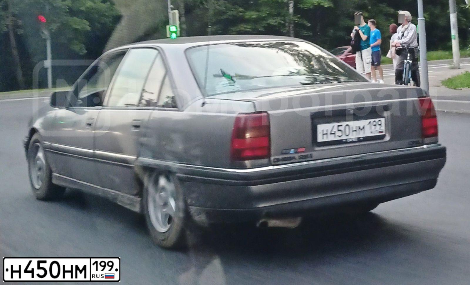 Фото автомобиля OPEL OMEGA, 1992 — госномер Н450НМ199. Цвет: ТЕМНО-СЕРЫЙ