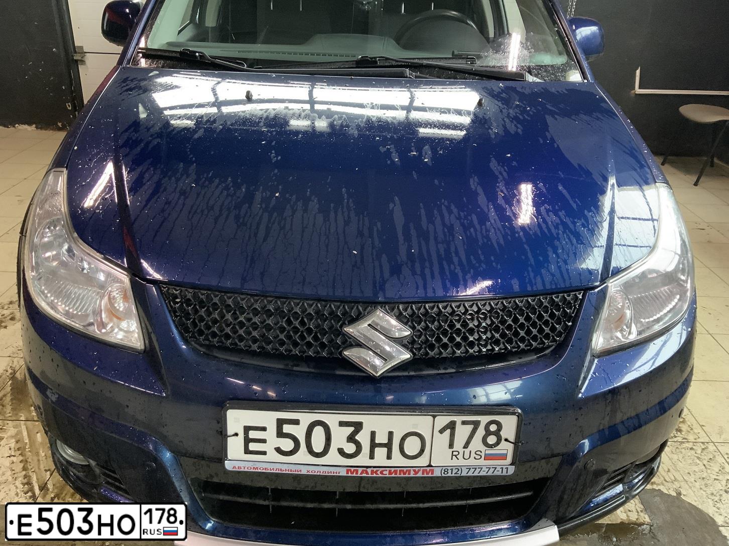 Фото автомобиля SUZUKI SX 4, 2010 — госномер Е503НО178. Цвет: СИНИЙ