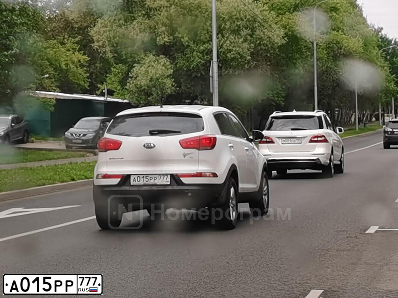 Фото автомобиля KIA SPORTAGE, 2015 — госномер А015РР777. Цвет: Белый