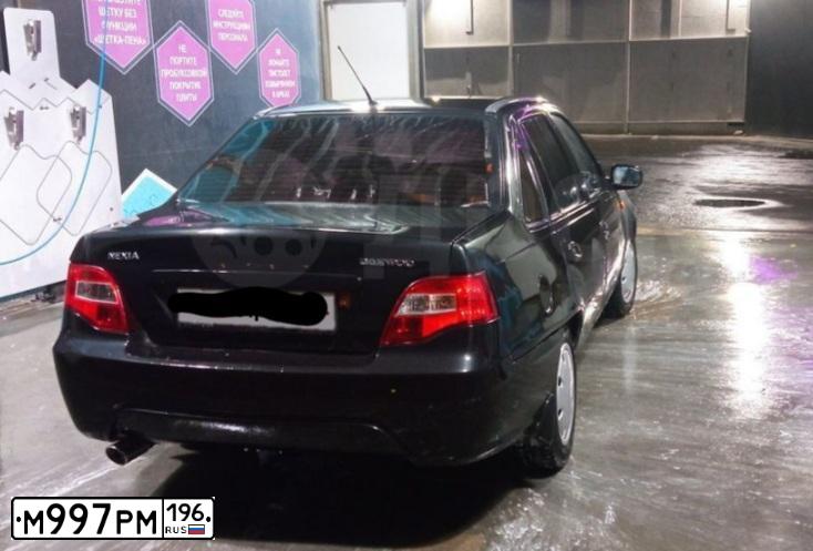 Фото автомобиля DAEWOO NEXIA, 2010 — госномер Т874ОМ196. Цвет: ЧЕРНЫЙ