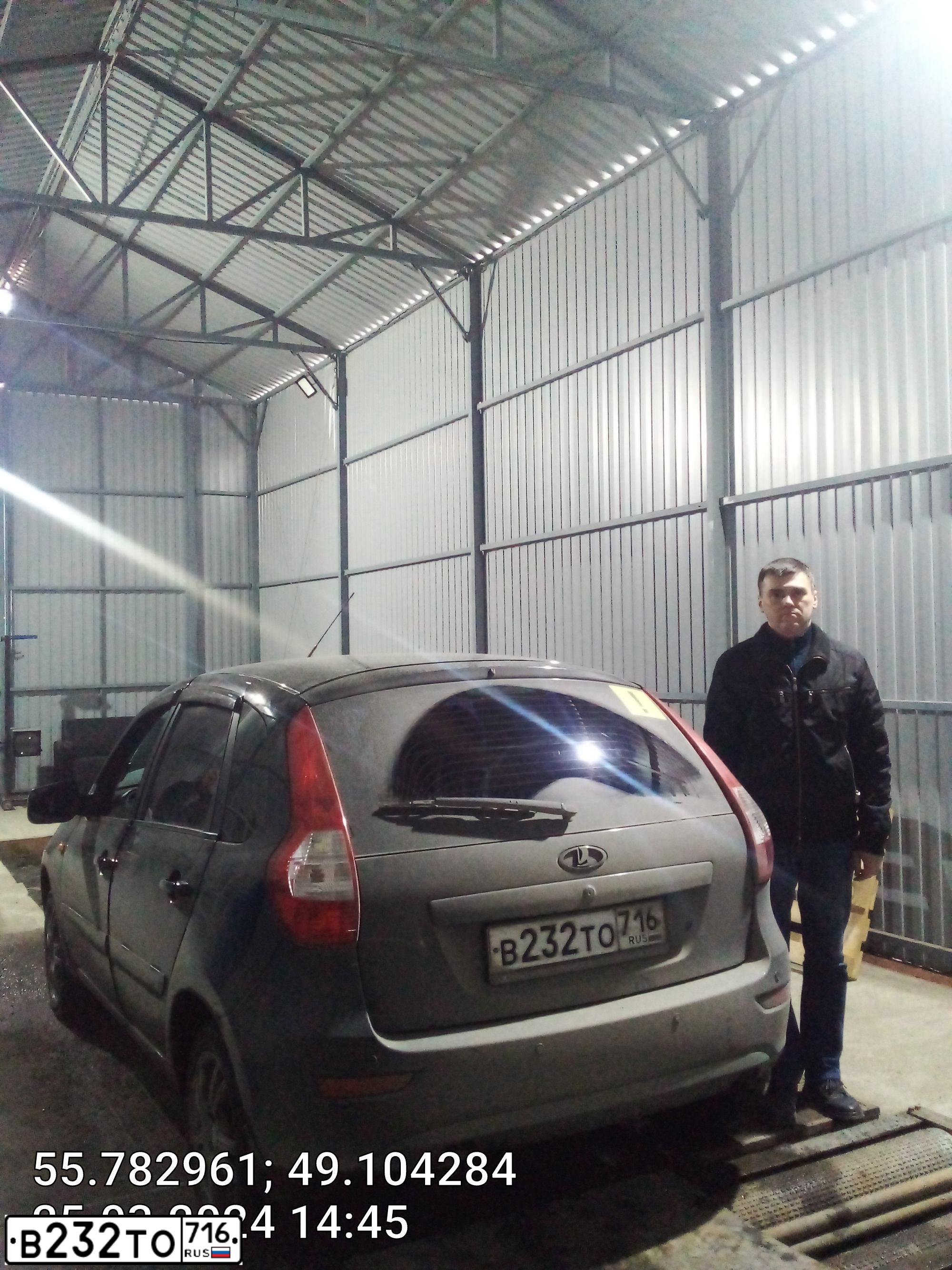 Фото автомобиля LADA 2192 KALINA, 2013 — госномер В232ТО716. Цвет: Сине-Черный
