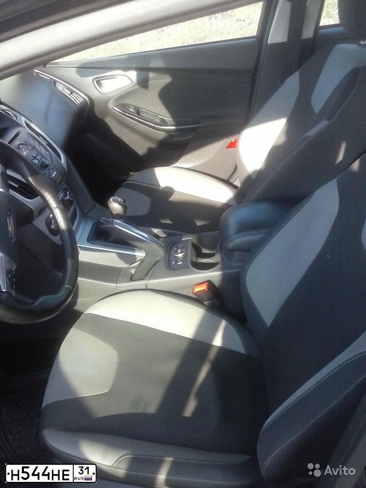 Фото автомобиля FORD FOCUS, 2013 — госномер О130КН31. Цвет: ЧЕРНЫЙ