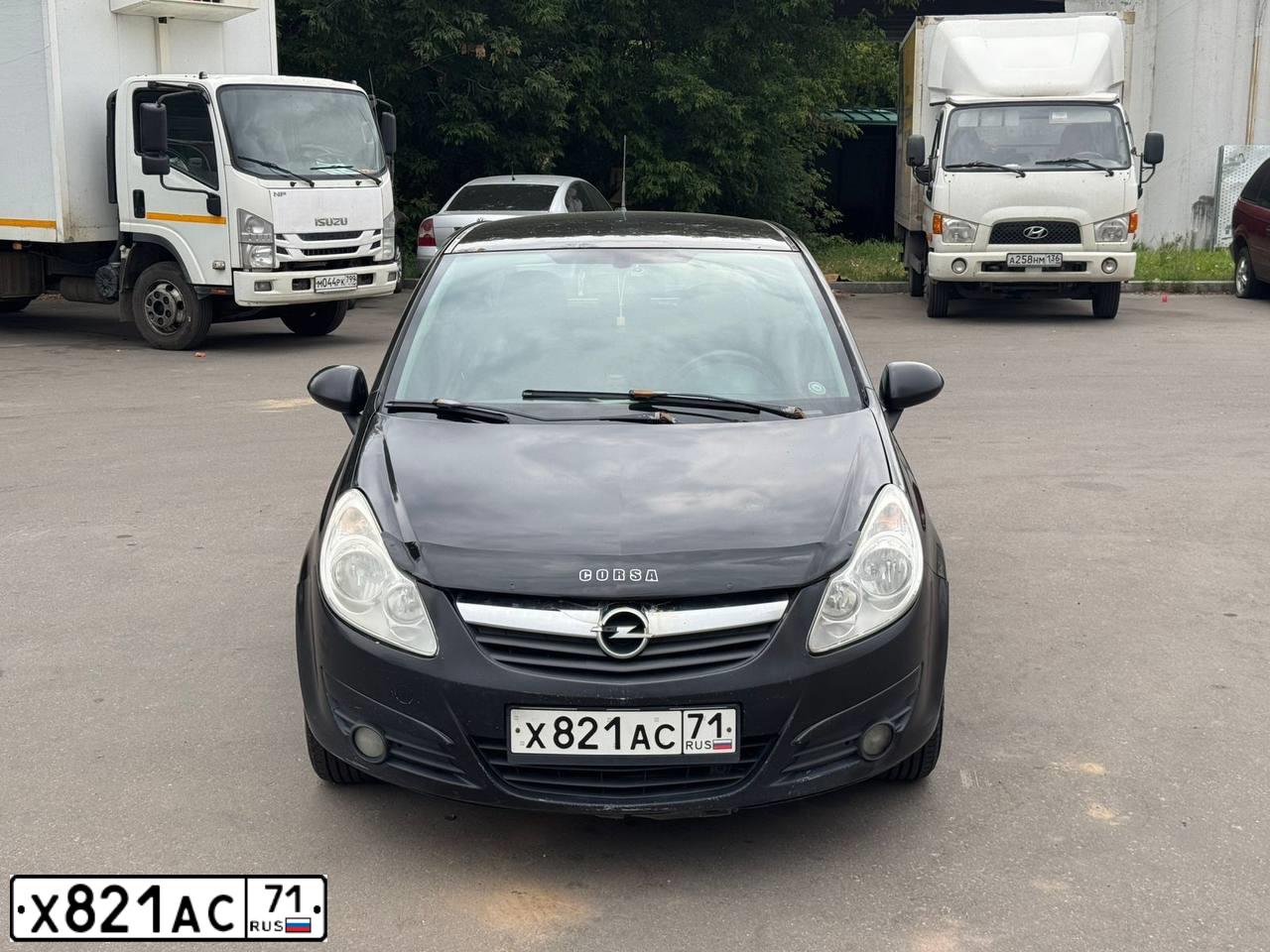 Фото автомобиля OPEL CORSA, 2007 — госномер Х821АС71. Цвет: ЧЕРНЫЙ