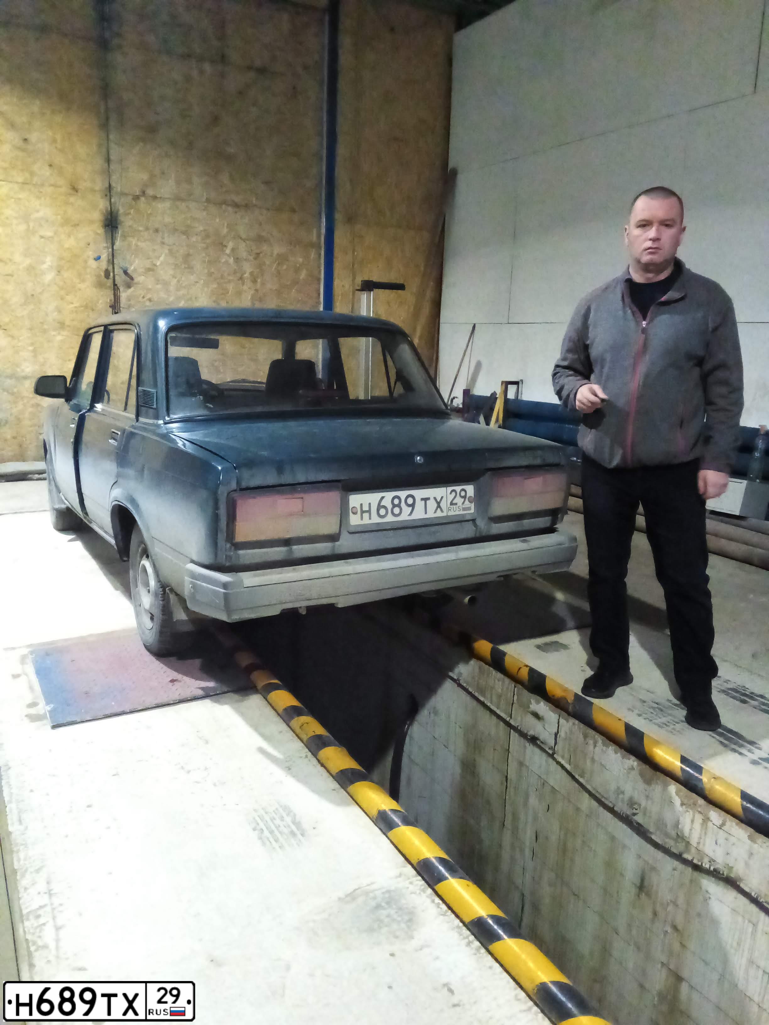 Фото автомобиля LADA 2107, 2005 — госномер О141ОН29. Цвет: Темно-зеленый