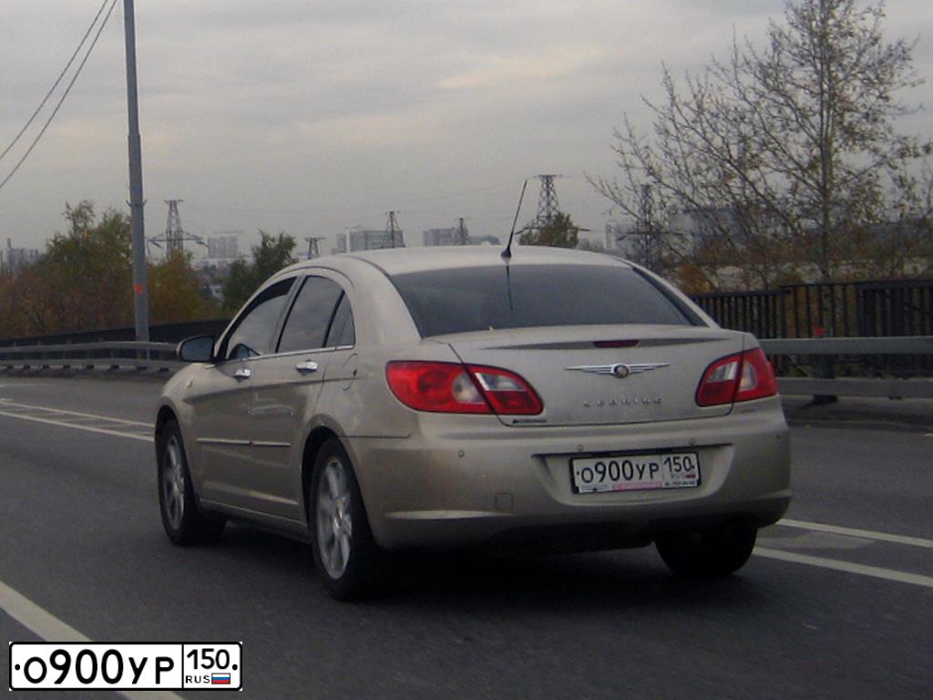 Фото автомобиля RENAULT MEGANE /GRAND/ SCENIC, 2009 — госномер О900УР150. Цвет: ЧЕРНЫЙ