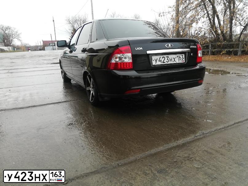 Фото автомобиля LADA PRIORA, 2014 — госномер К972СМ147. Цвет: ЧЕРНЫЙ