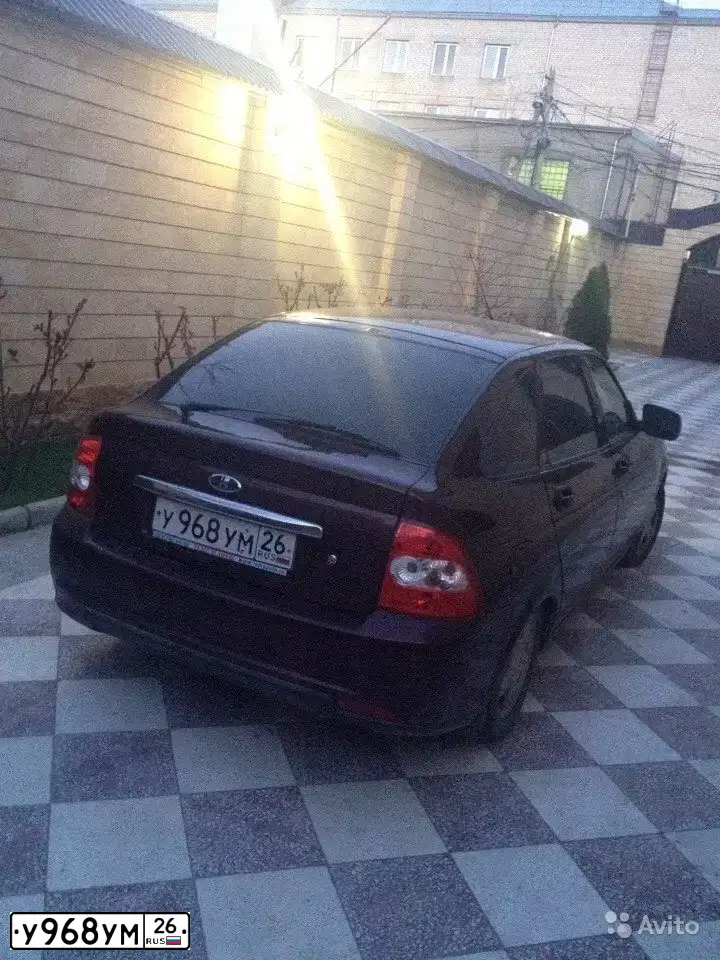 Фото автомобиля LADA PRIORA, 2011 — госномер Р715СО05. Цвет: ТЕМНО-ВИШНЕВЫЙ