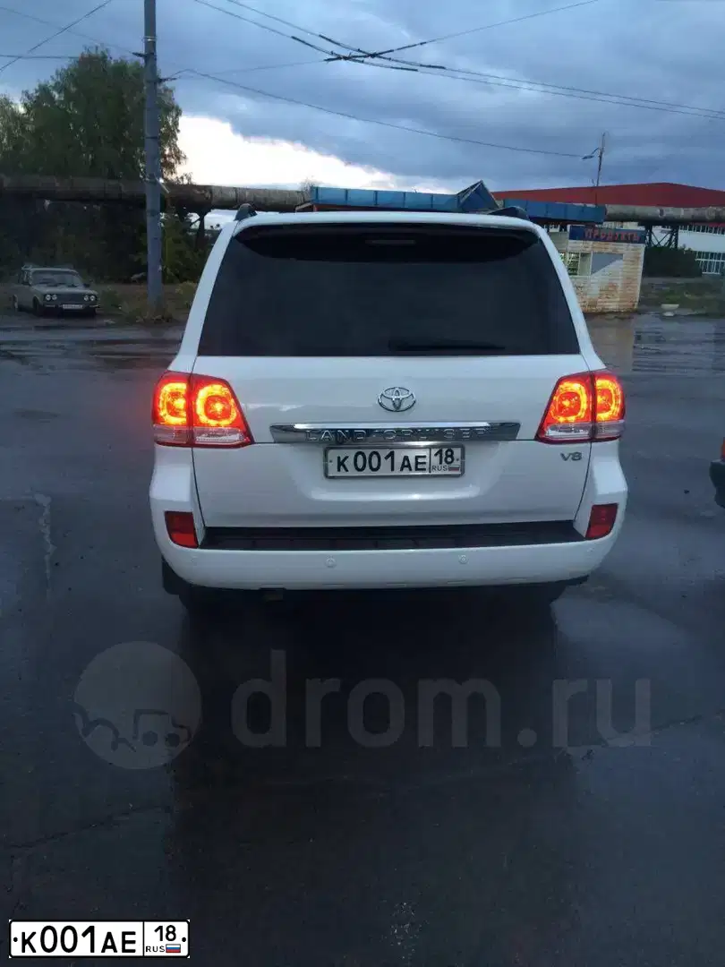 Фото автомобиля LADA 2106, 1997 — госномер К001АЕ18. Цвет: ЗЕЛЕНЫЙ САД
