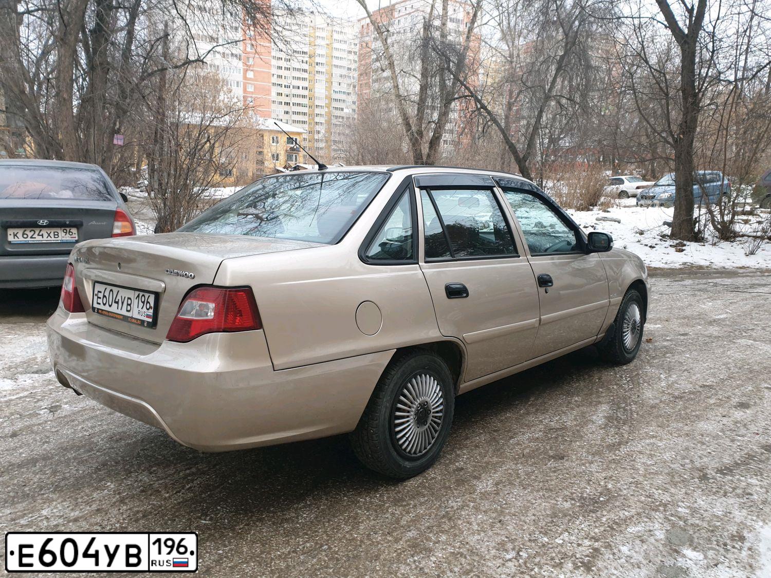 Фото автомобиля DAEWOO NEXIA, 2012 — госномер Е604УВ196. Цвет: БЕЖЕВО-ЖЕЛТЫЙ