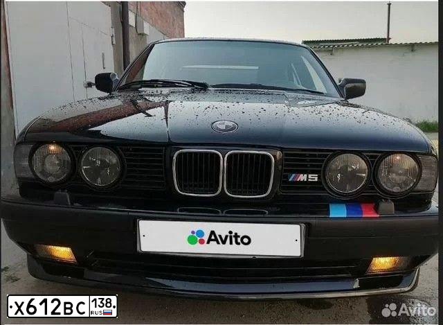 Фото автомобиля БМВ М5, 1991 — госномер В221ТС797. Цвет: ЧЕРНЫЙ