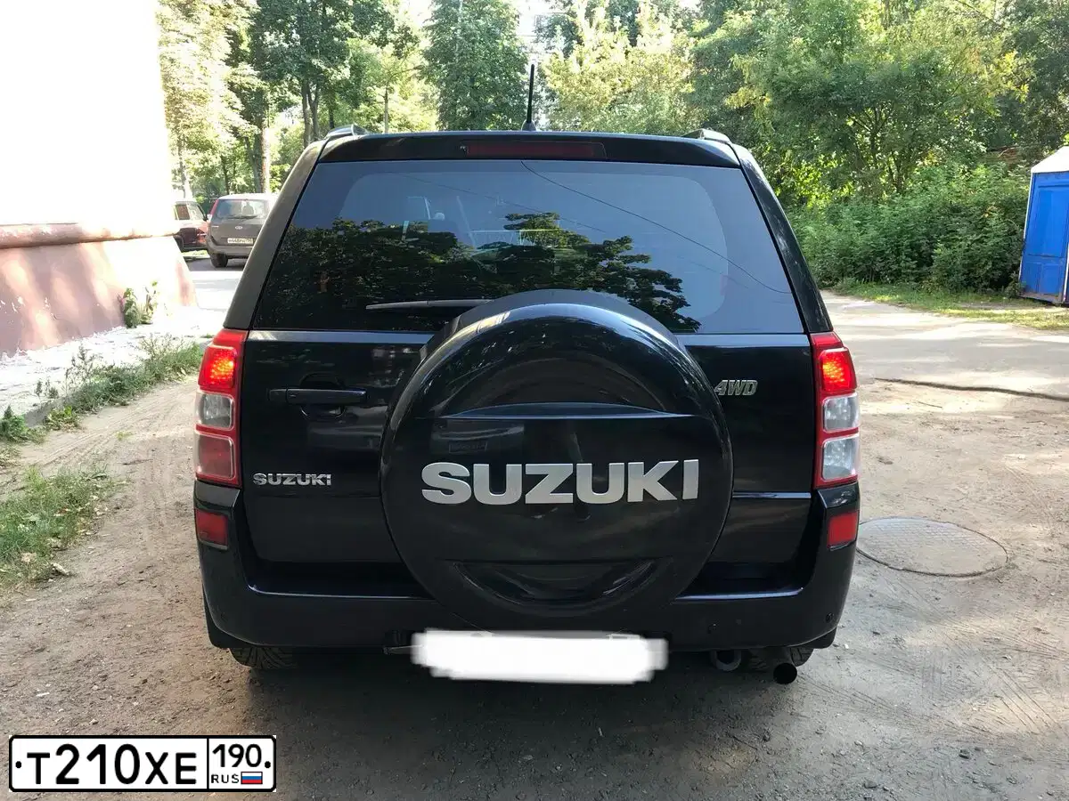 Фото автомобиля SUZUKI /GRAND/ VITARA, 2012 — госномер Т210ХЕ190. Цвет: ЧЕРНЫЙ