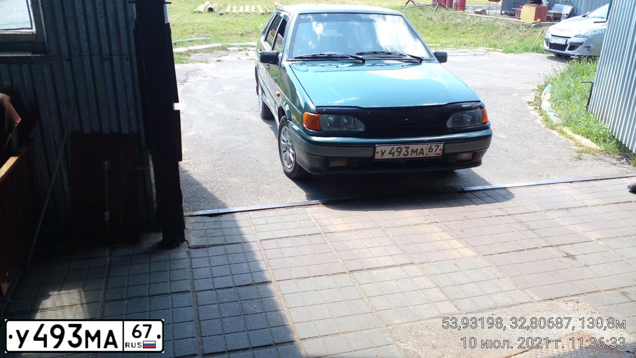Фото автомобиля LADA 2115 SAMARA, 2004 — госномер М410РТ67. Цвет: ТЕМНО-ЗЕЛЕНЫЙ