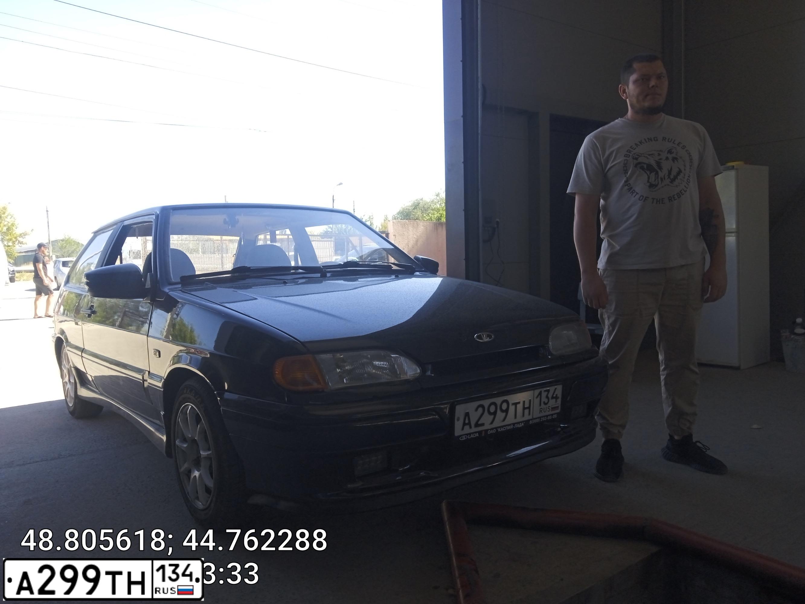 Фото автомобиля LADA 2113 SAMARA, 2005 — госномер А299ТН134. Цвет: ЧЕРНЫЙ