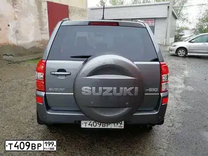 Фото автомобиля SUZUKI /GRAND/ VITARA, 2008 — госномер Т409ВР199. Цвет: ТЕМНО-СЕРЫЙ