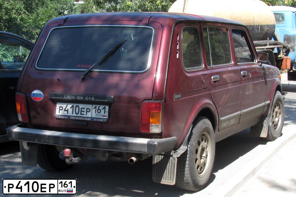 Фото автомобиля LADA 2131 NIVA, 2006 — госномер Р410ЕР161. Цвет: ТЕМНО-МАЛИНОВЫЙ