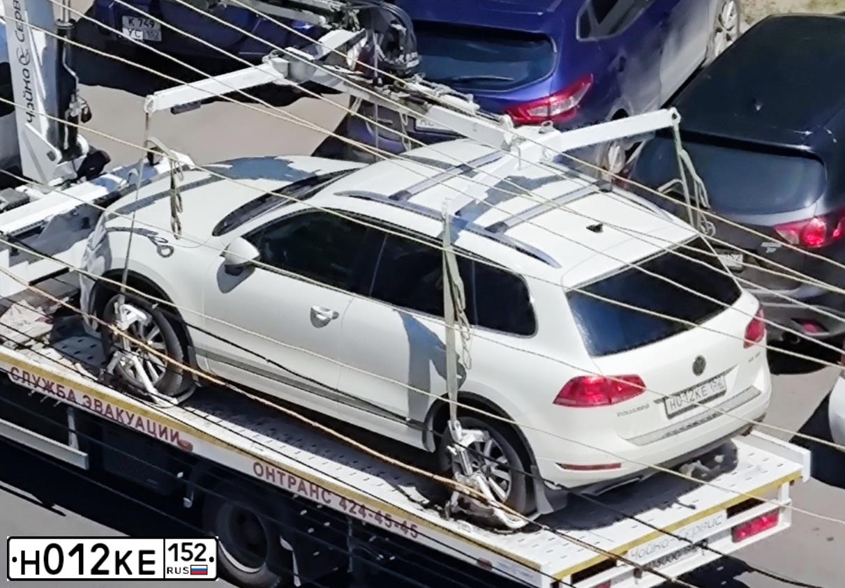 Фото автомобиля VOLKSWAGEN TOUAREG, 2010 — госномер Н012КЕ152