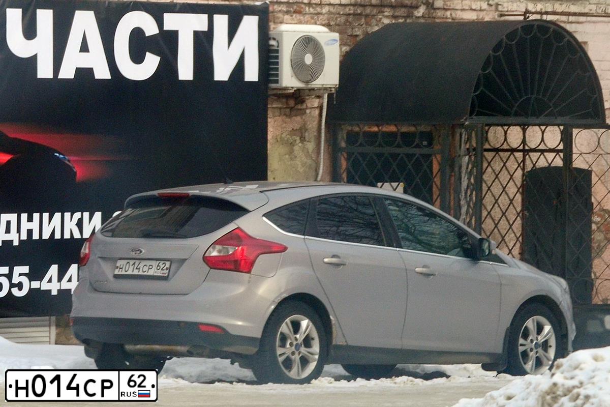 Фото автомобиля FORD FOCUS, 2011 — госномер Х382КН31. Цвет: СЕРО-ГОЛУБОЙ