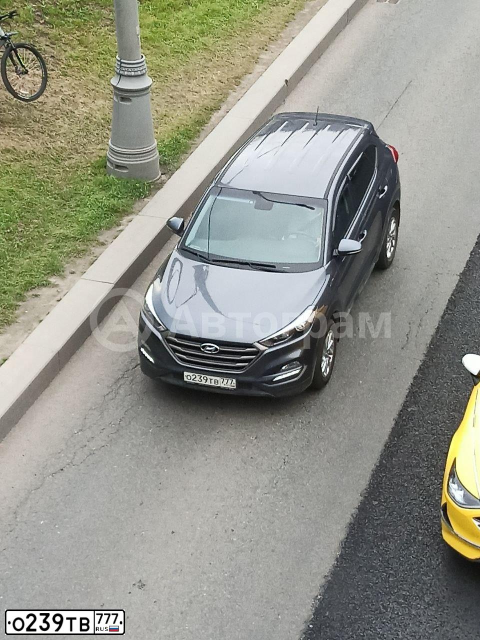 Фото автомобиля HYUNDAI TUCSON, 2016 — госномер О239ТВ777. Цвет: Серый