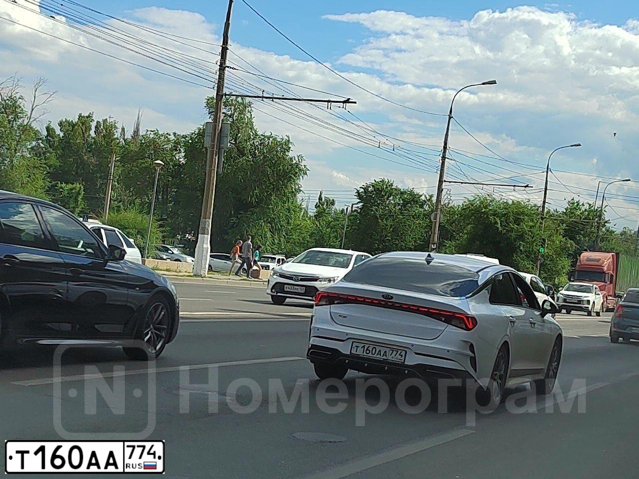 Фото автомобиля KIA K5, 2020 — госномер Т160АА774. Цвет: БЕЛЫЙ