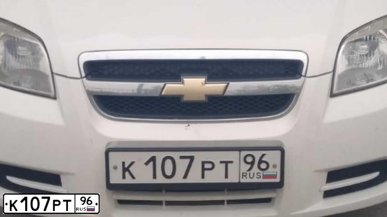 Фото автомобиля CHEVROLET AVEO, 2007 — госномер К107РТ96. Цвет: БЕЛЫЙ