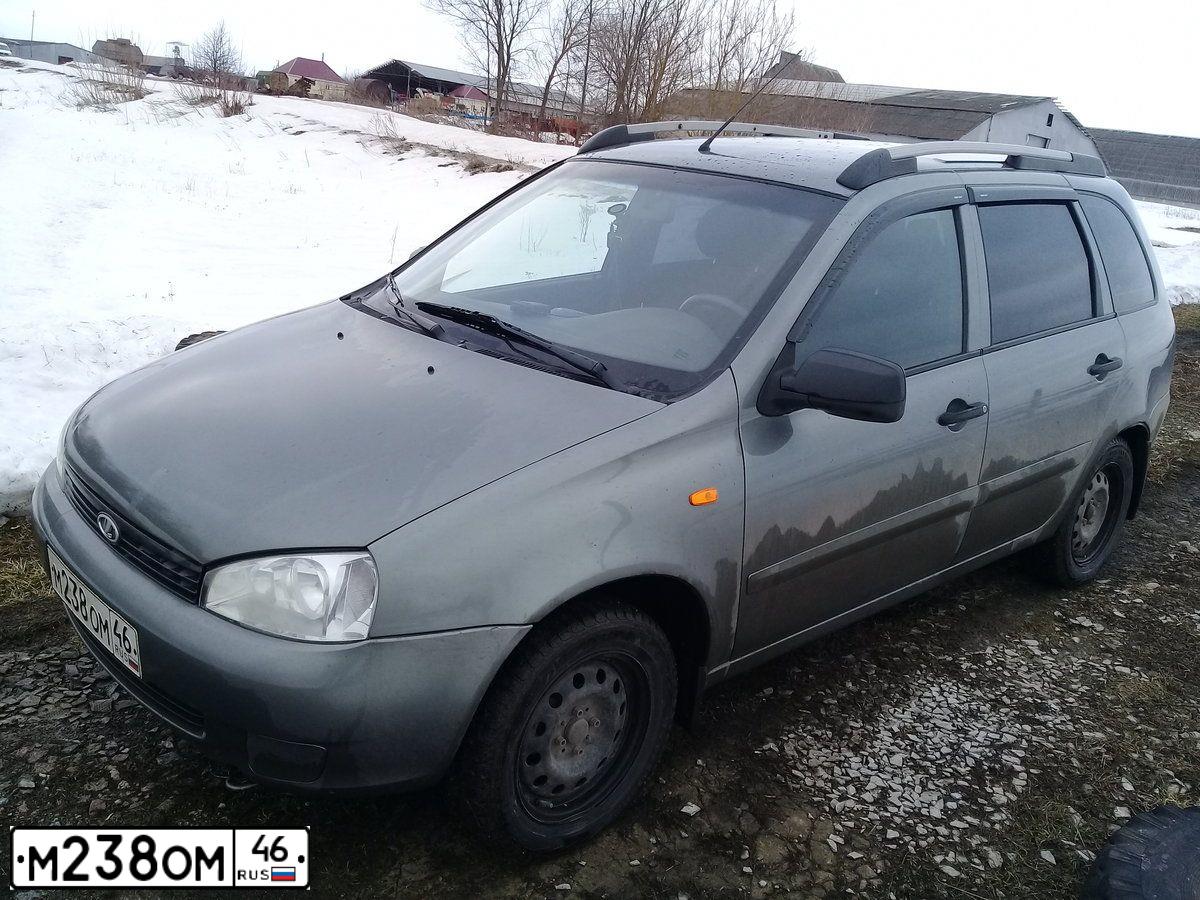 Фото автомобиля LADA 1117 KALINA, 2011 — госномер М238ОМ46. Цвет: Темно-серый металлик